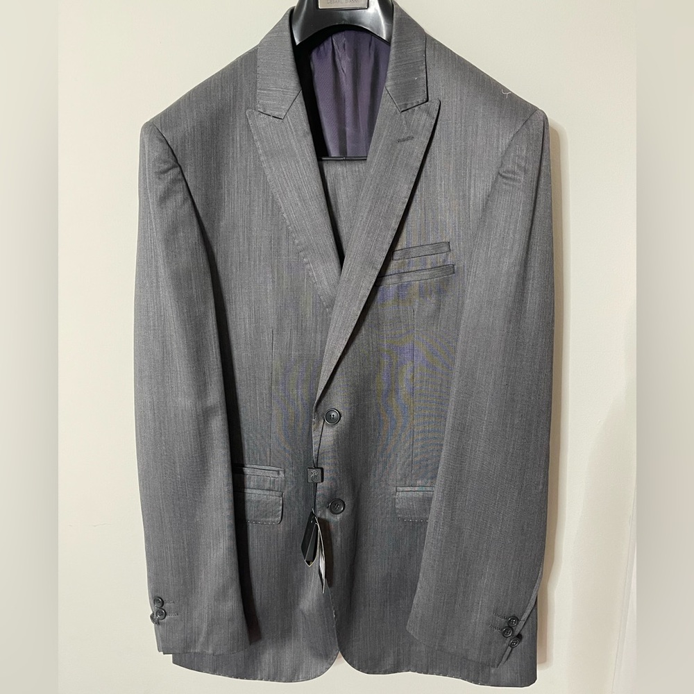 NWT mens grey suit 58/42 Euro.  Husband tried it on more like a big 44/small 46